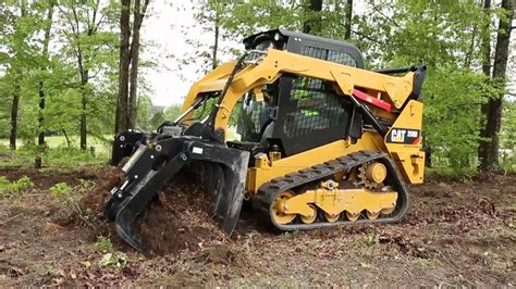 caterpillar skid steer grapple|caterpillar attachment card.